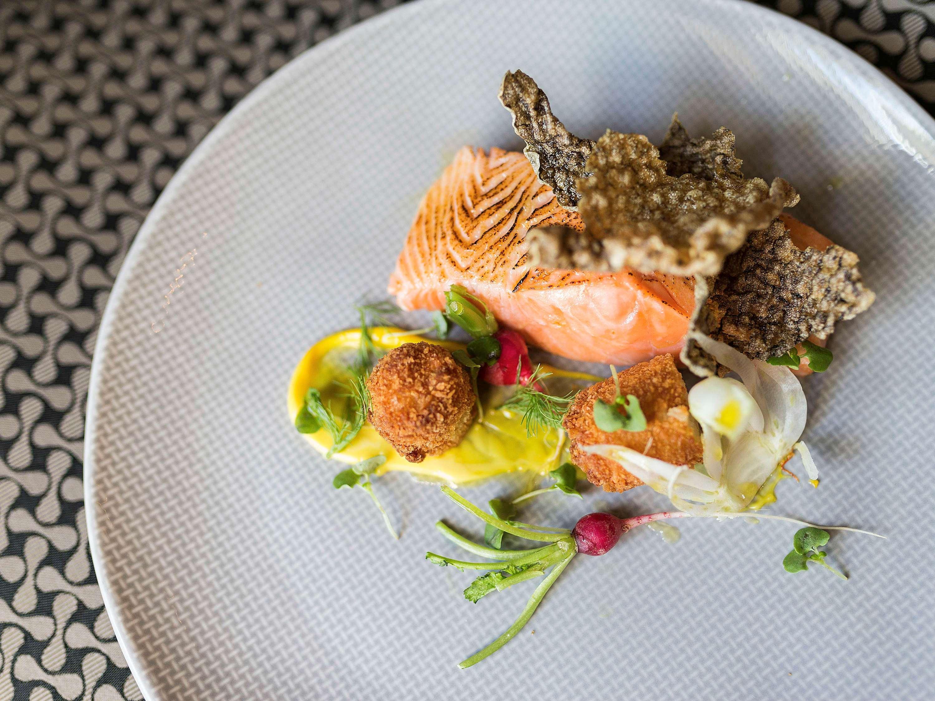Pullman Sydney Olympic Park Hotel Buitenkant foto Salmon prepared with a sauce of white wine, mustard, and cream