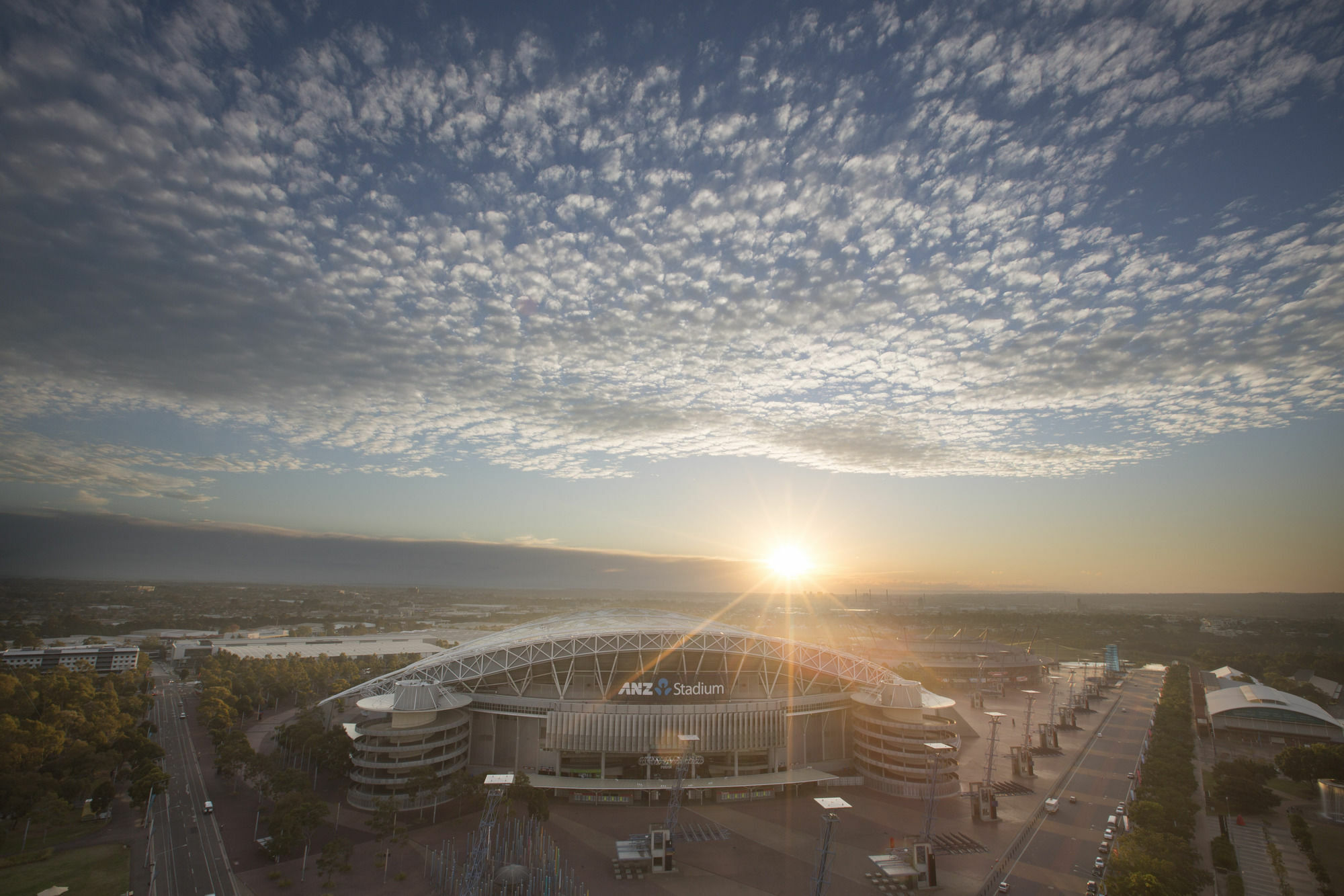 Pullman Sydney Olympic Park Hotel Buitenkant foto The stadium at sunset